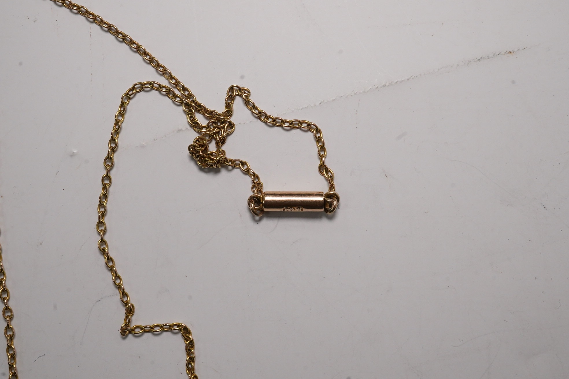 An Edwardian 9ct and gem set drop pendant necklace, pendant 43mm, chain tangled Condition - poor to fair